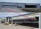 Vertikale Bi-Falten-Hangar-Tür-Lösungs-Licht-einzelne Stahlplatten-hydraulisches Flugzeug-Tür-System fournisseur